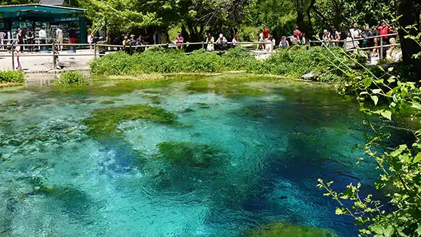 Clear blue spring water at the Blue Eye natural attraction in southern Albania